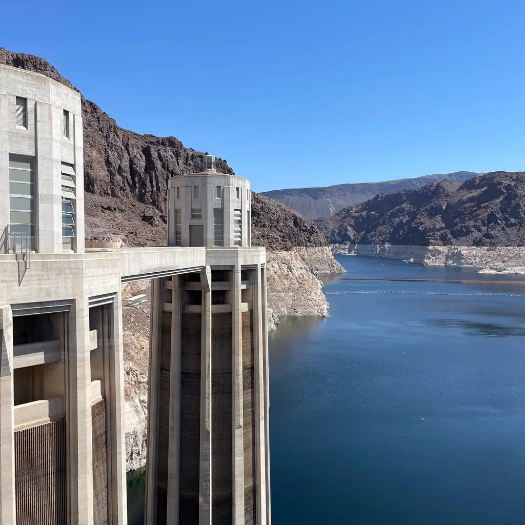 Concrete intake towers stand beside the reservoir at Hoover Dam.