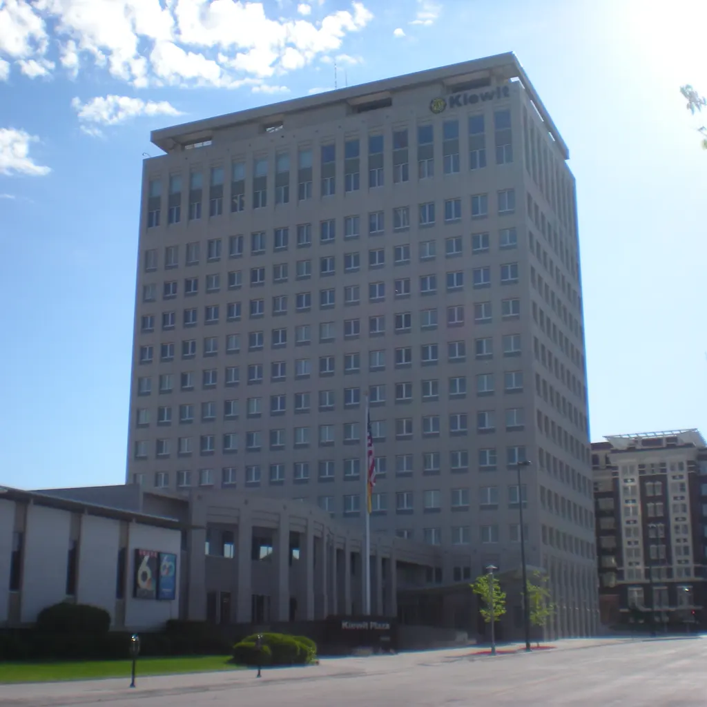A tall office building viewed from street level.