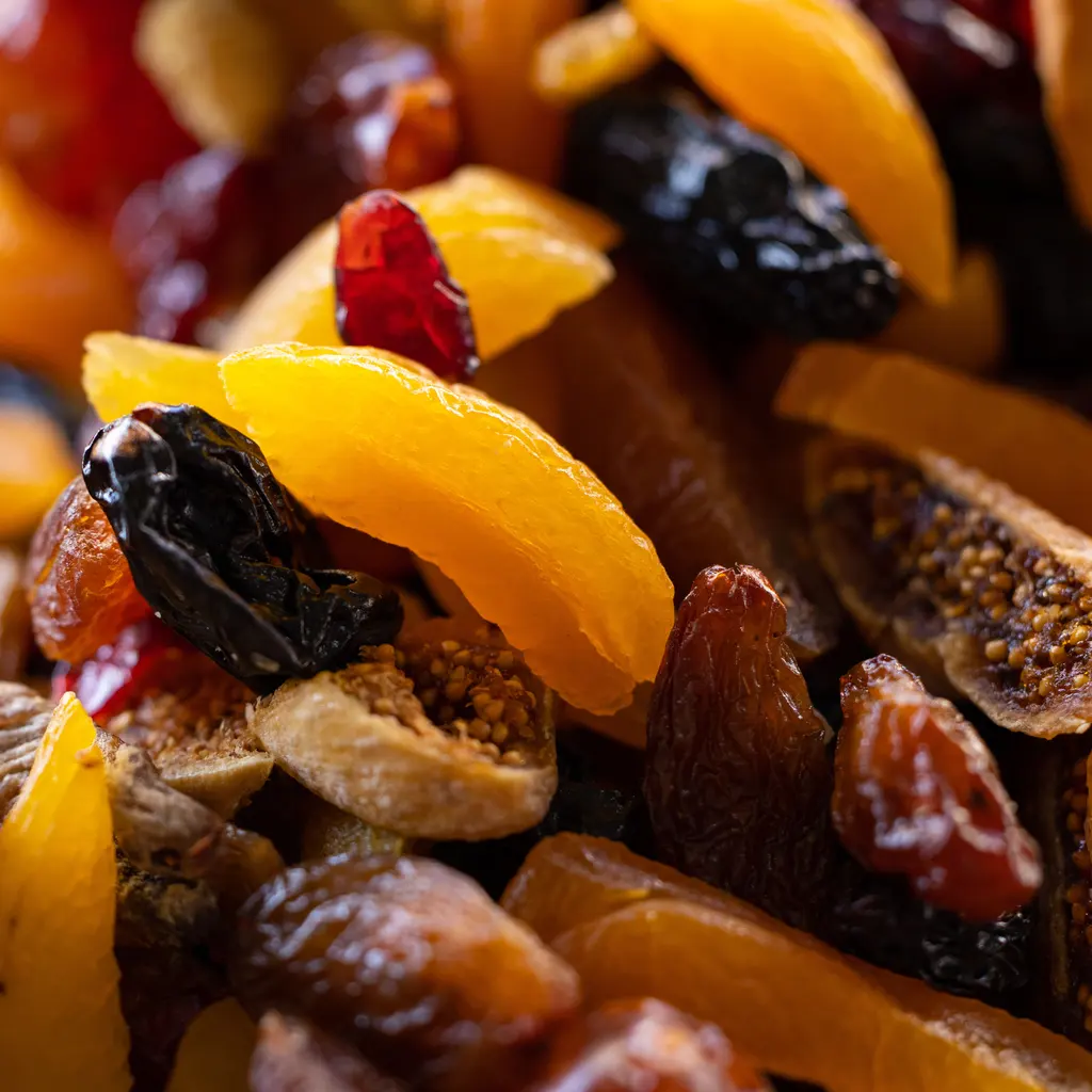 An assortment of dried apricots, figs, dates and raisins.