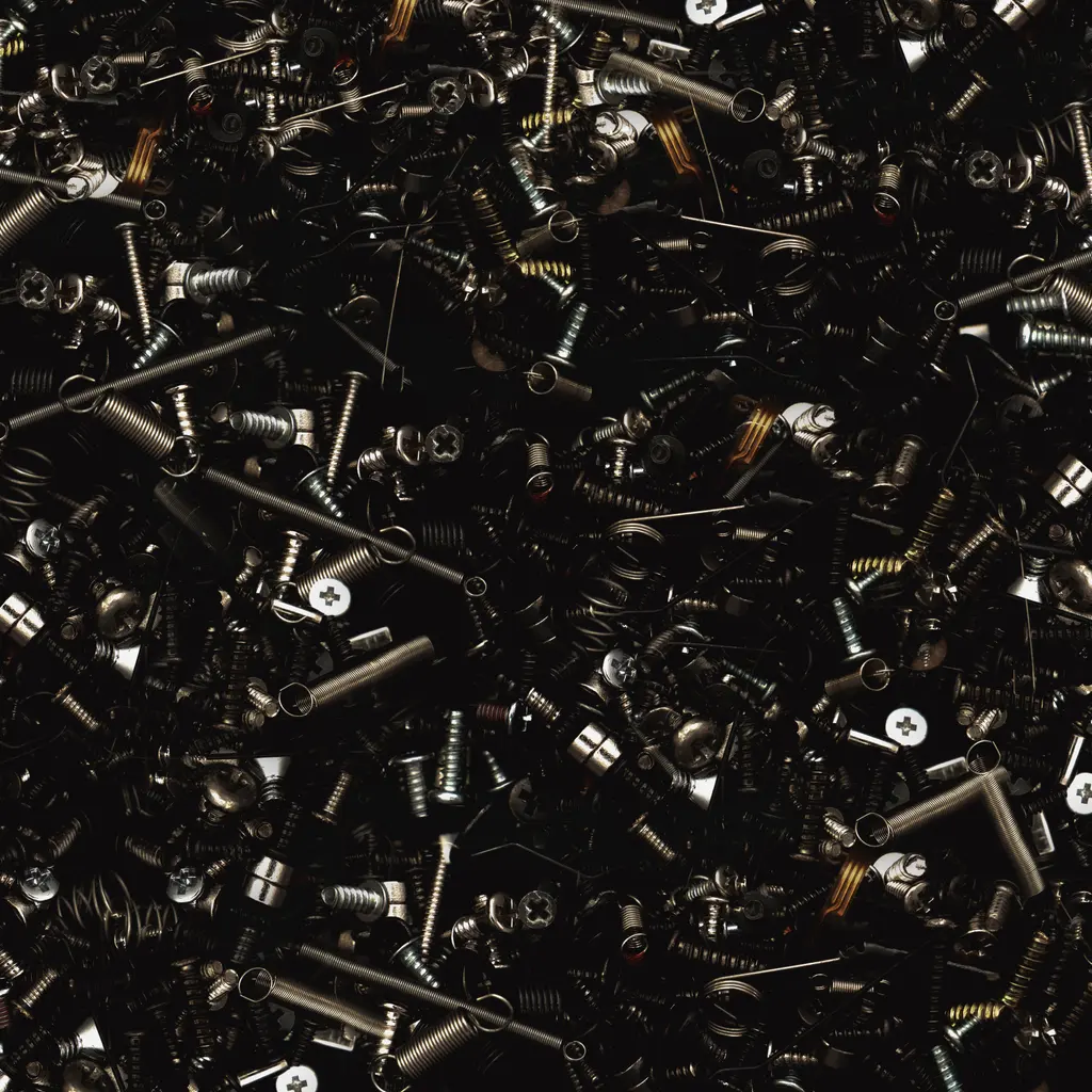 A close view of assorted metal screws, bolts and nuts.