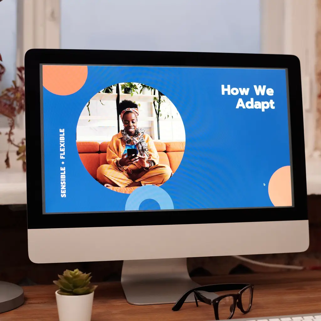 A designed slide presentation displayed on a desktop workstation.