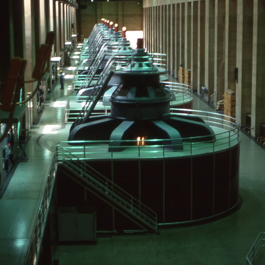Rows of generating units inside a hydroelectric power station.