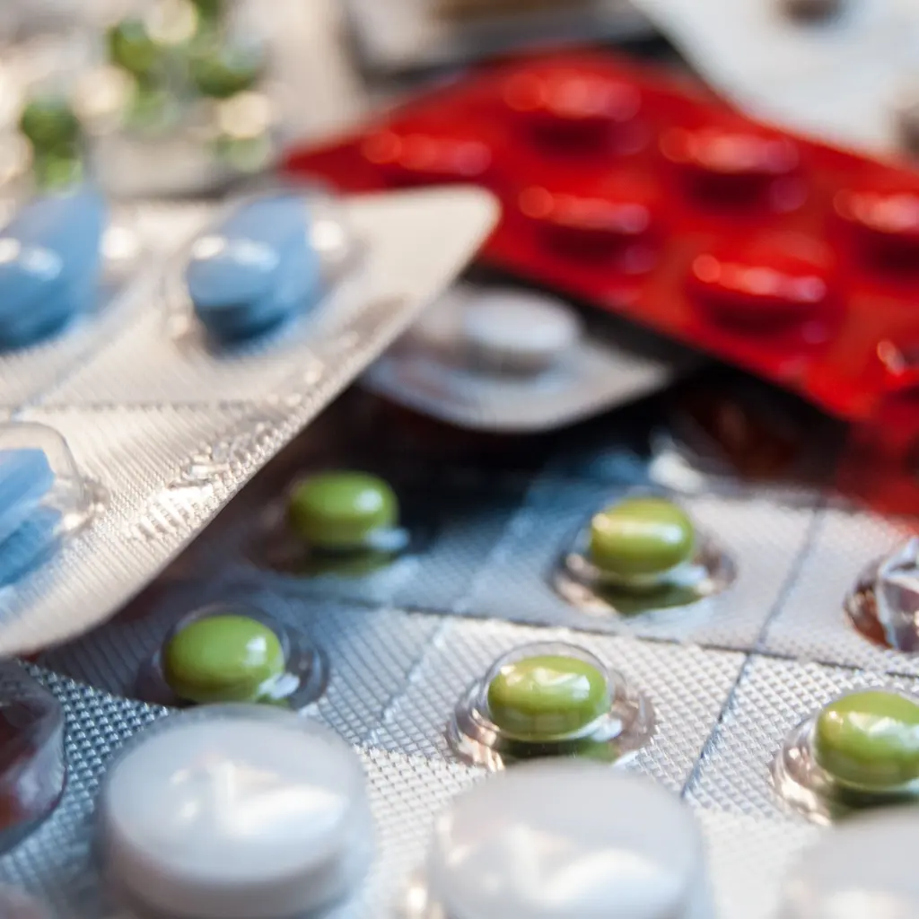 Tablets sealed in foil-backed blister packs.