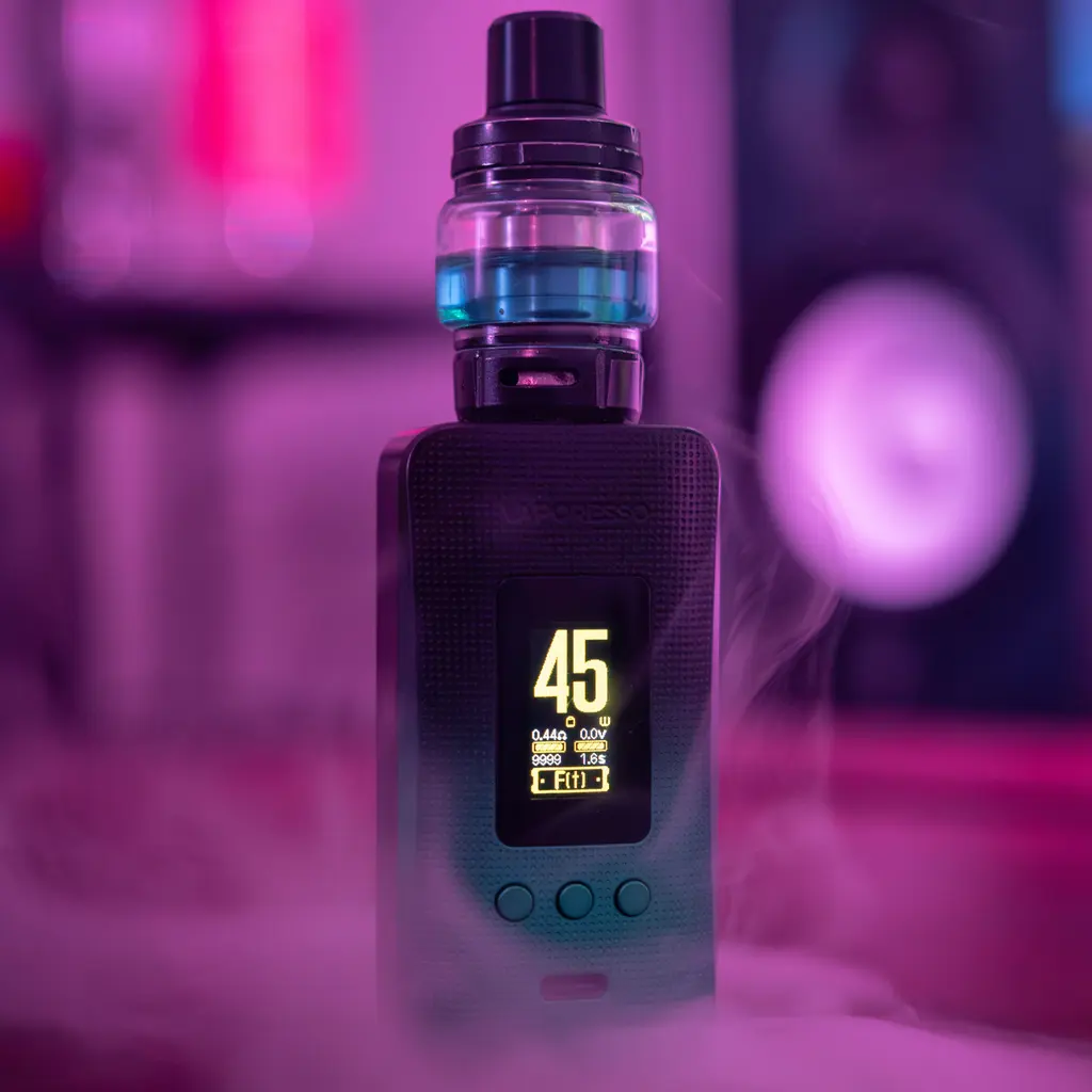 An electronic-cigarette device with a liquid tank and illuminated display.