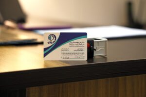Business card on a desk representing insights on what Medicare doesn't cover and how to fill the gaps.