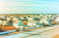 "Overview of a neighborhood, illustrating how to reduce liability risks for your small business."