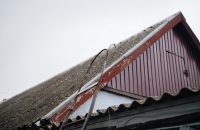 "Preparing your home for storm season: checking roof readiness and home insurance options."
